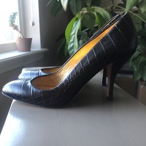 Black leather pumps